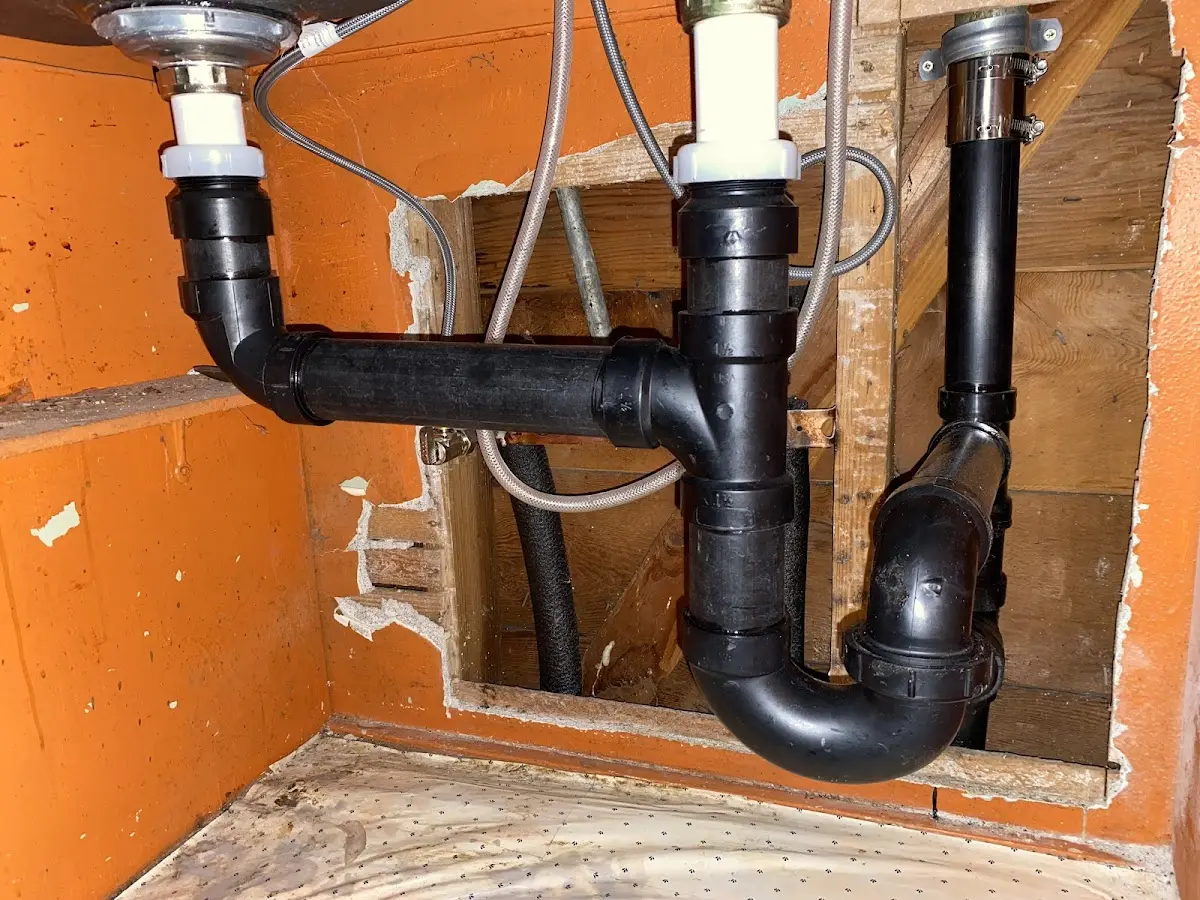 Professional Garbage Disposal Repair equipment and tools on the job in Carlinville